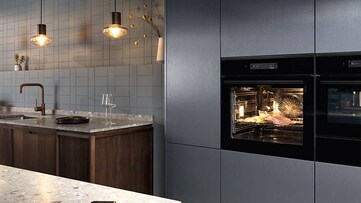 En stilrent kök från Electrolux med integrerade vitvaror.